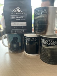 three coffee mugs with the words the project on them